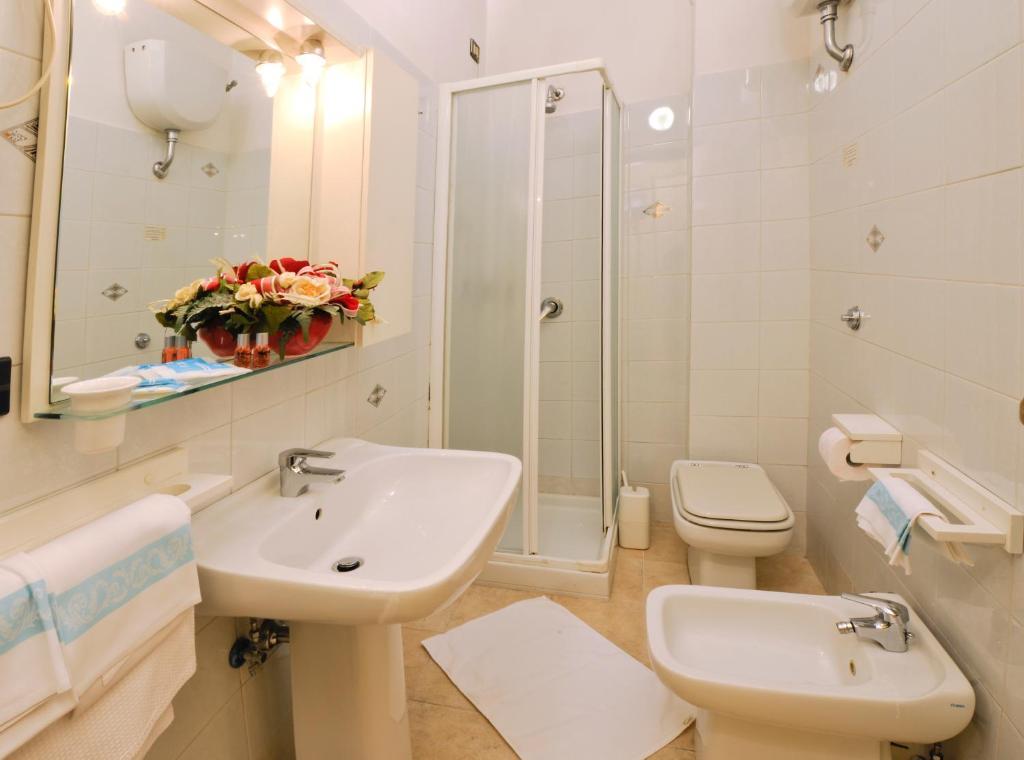 Hotel Amalfitana Pisa Pokoj fotografie