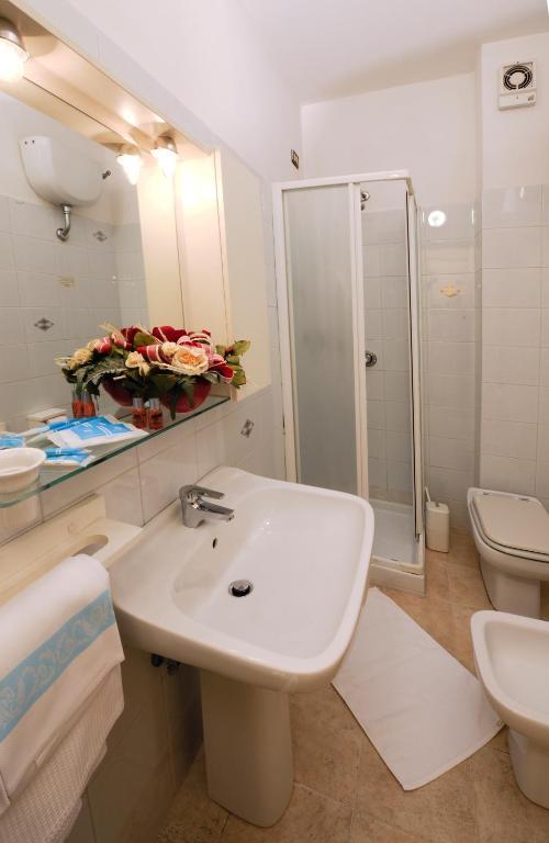 Hotel Amalfitana Pisa Pokoj fotografie